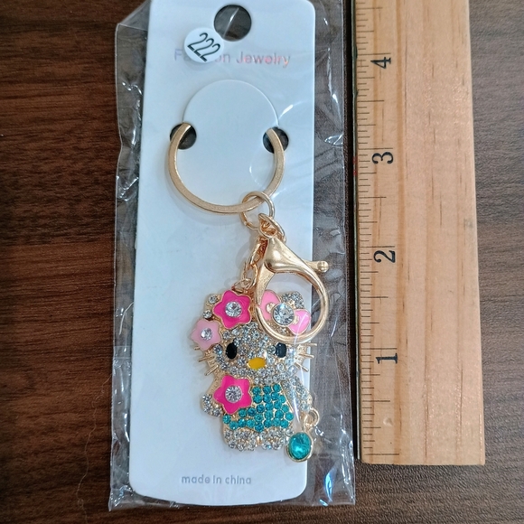 Cute Hello Kitty Gold and Blue Keychain - Picture 2 of 2